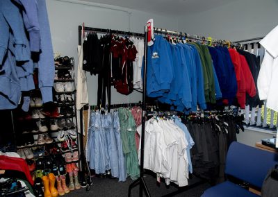 An image of school uniform and shoes which are available at the support centre